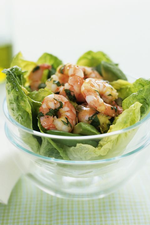 shrimp in lettuce cups in a glass bowl