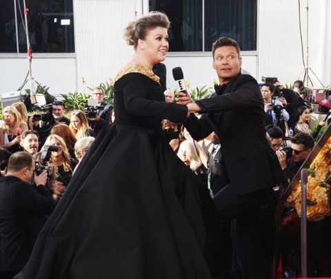 Kelly Clarkson and Ryan Seacrest at the 2018 Golden Globes