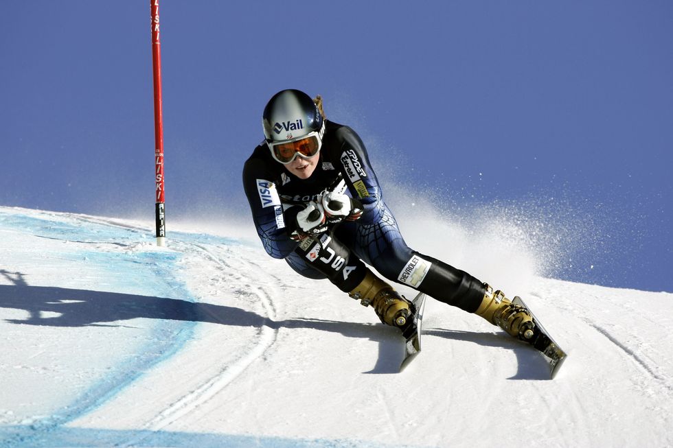 Skier, Alpine skiing, Winter sport, Ski boot, Skiing, Downhill, Extreme sport, Ski, Slalom skiing, Recreation, 