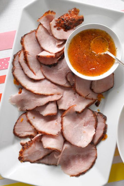 apricot and spiced glaze ham on a white plate