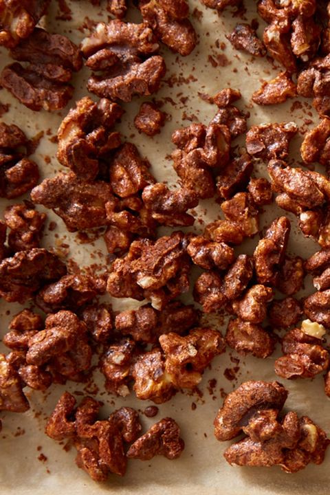 a close up of spicy coated walnuts