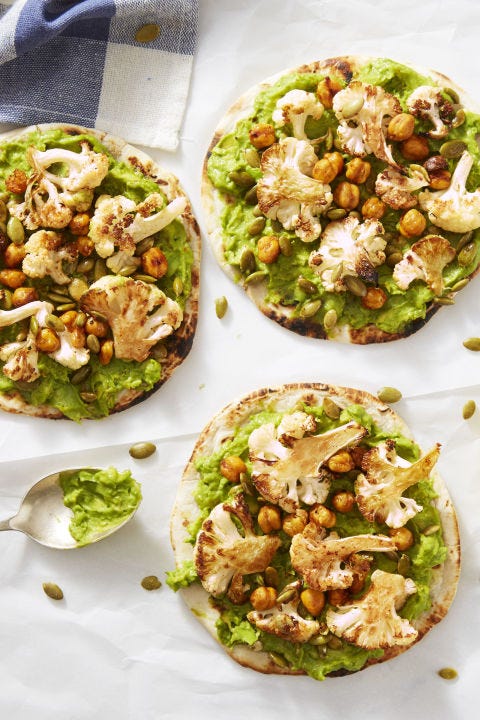 a close up of bbq chickpea  cauliflower flatbreads with avocado mash