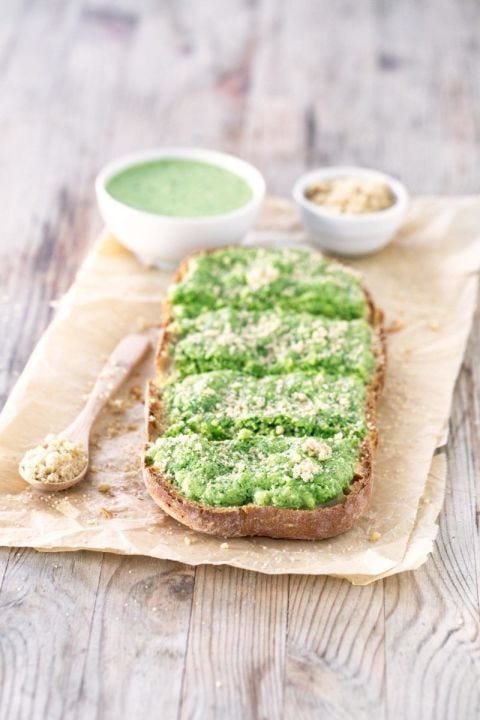 a closeup of green vegan garlic bread
