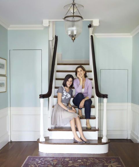 mother and daughter on staircase