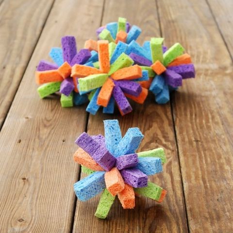 sponges are assembled into starburst shapes to make spiky sponges for water fights the project is a good housekeeping pick for best activities for kids