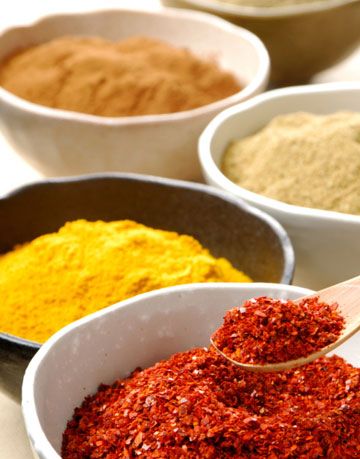 bowls of brightly colored spices
