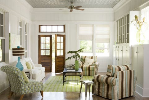living room with open doors and windows