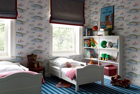 child's bedroom with boat wall paper