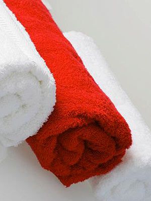 red and white bath towels