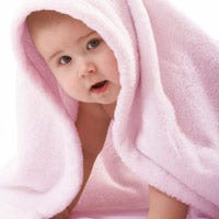 Baby in pink towel
