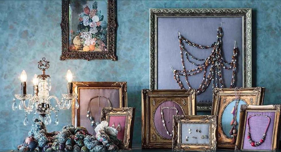 Purple, Picture frame, Lavender, Art, Interior design, Teal, Visual arts, Still life photography, Collectable, Creative arts, 
