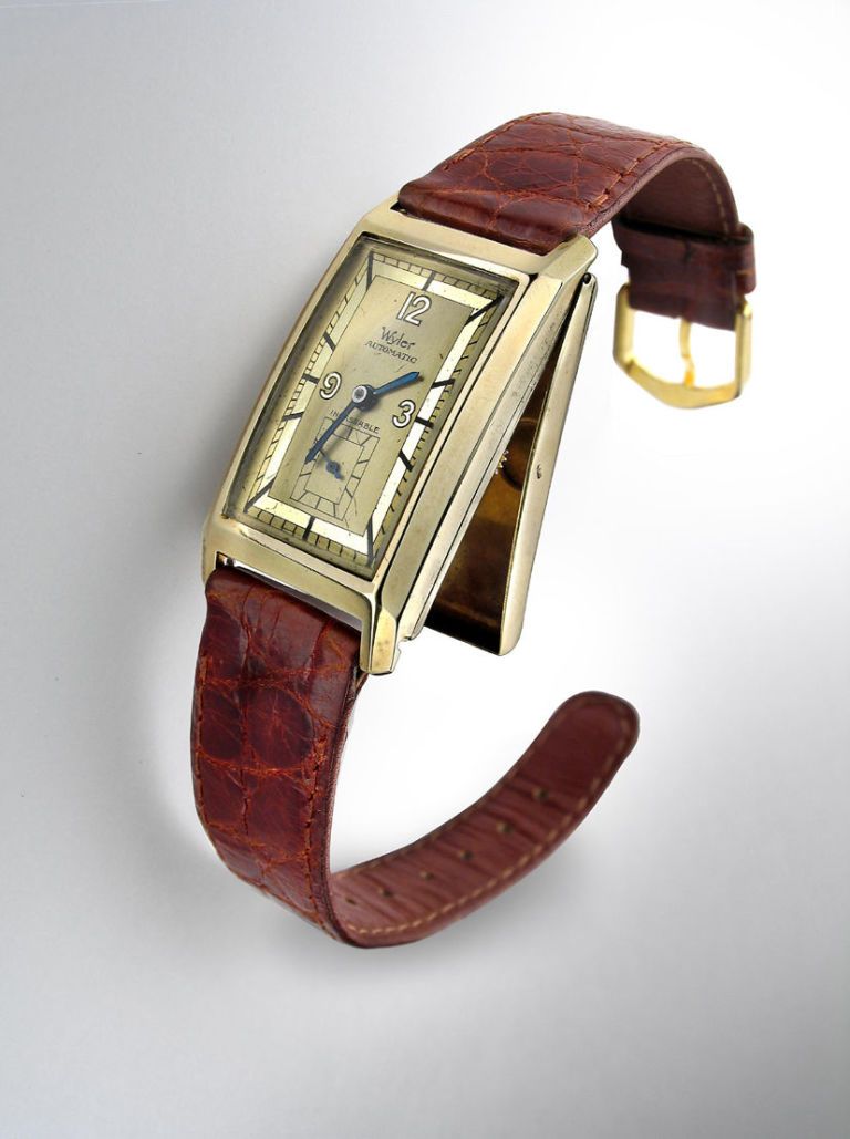 Brown, Product, Watch, Amber, Tan, Maroon, Strap, Watch accessory, Beige, Material property, 