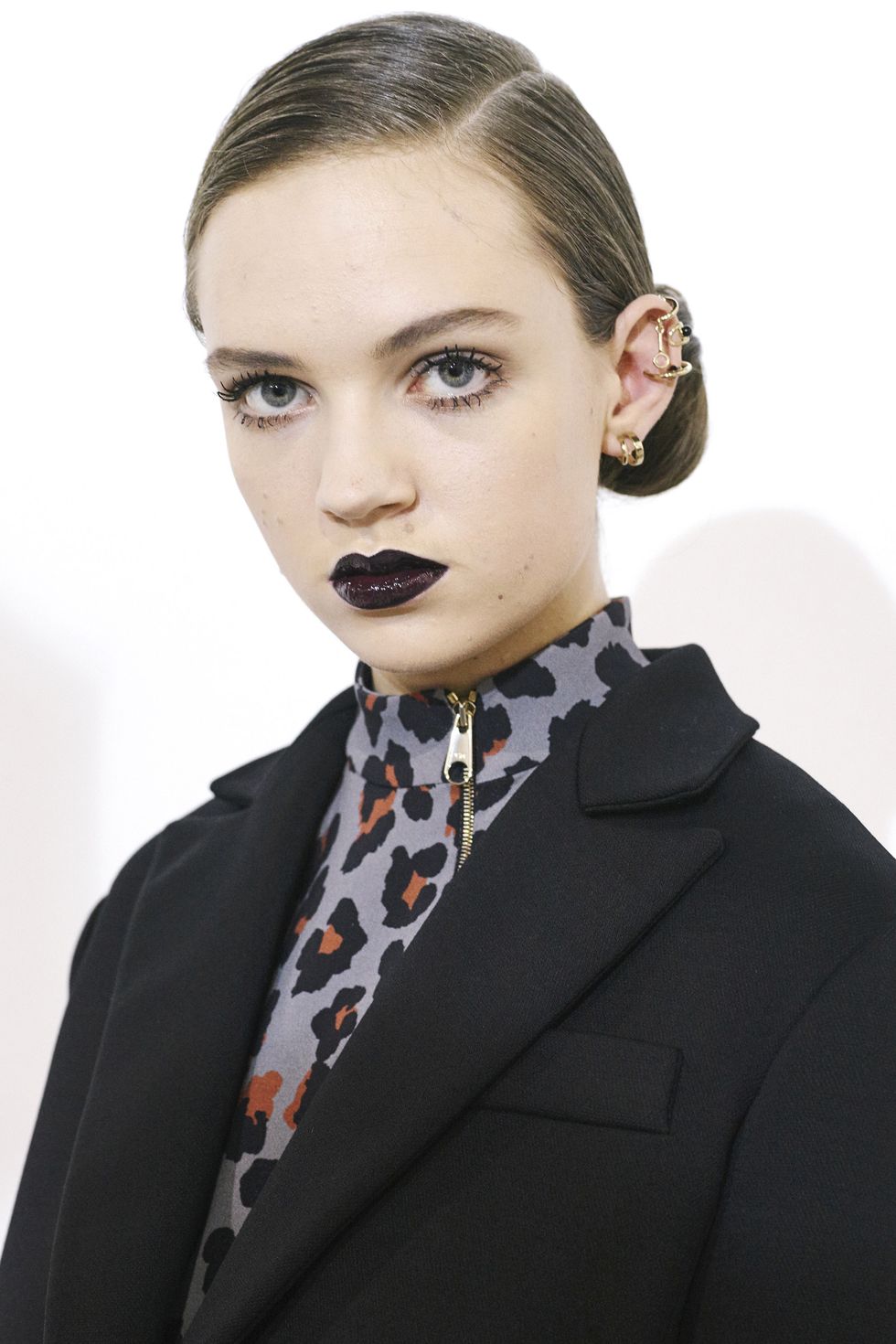 <p>Dior's sultry black-lipped models also sported ears full of accessories. It's time for more, more, more.</p>