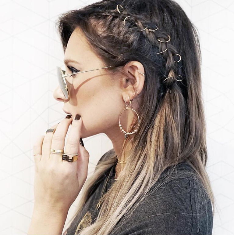 <p>As far as hair accessories go, it just doesn't get cooler than heavy metal rings that you clip into braids. For proof: Look no further than this look that Mane Addicts hairstylist Justine Marjan created for <a href="https://www.instagram.com/weworewhat/?hl=en" target="_blank">WeWoreWhat blogger Danielle Bernstein</a>. Whether it's two or three, or fifty, you're going to look badass.</p>