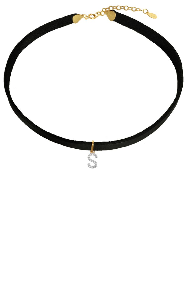 <p><strong>Letters by Zoe</strong> choker, $345, <a href="http://www.lettersbyzoe.com/diamond-initial-leather-choker/" target="_blank">lettersbyzoe.com</a>. </p>