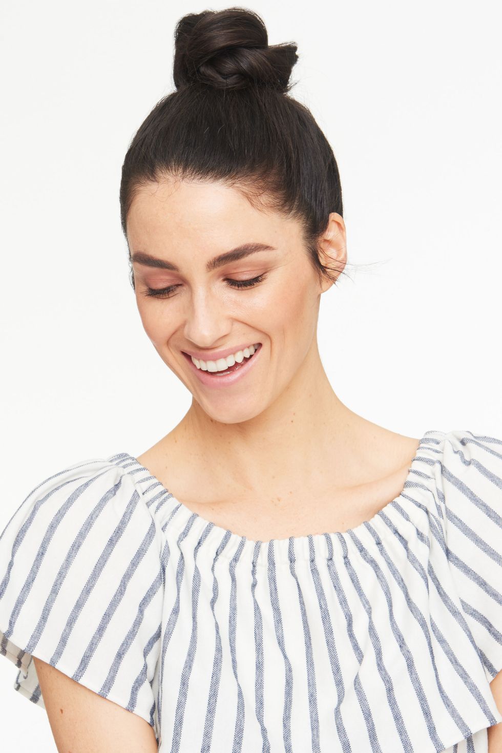 <p>To get even more out of this yoga-to-brunch look, apply a nourishing damage repair treatment like <a href="http://bit.ly/1UCWqHM" target="_blank">Suave Coconut Oil Infusion Oil Treatment</a> before brushing your strands up into a high ponytail. Then, split the tail in half and twist the sections to create a rope-like texture. Wrap the tail around itself on top of your head and stick in u-shaped pins to keep it in place. </p><p><em></em></p>