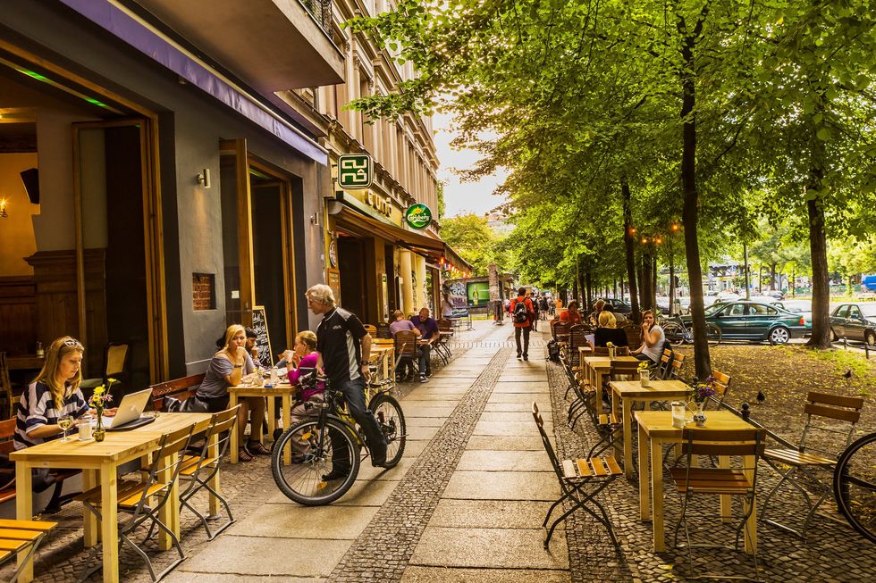 Tire, Wheel, Bicycle wheel, Road, Town, Neighbourhood, Public space, Street, Bicycle tire, Table, 