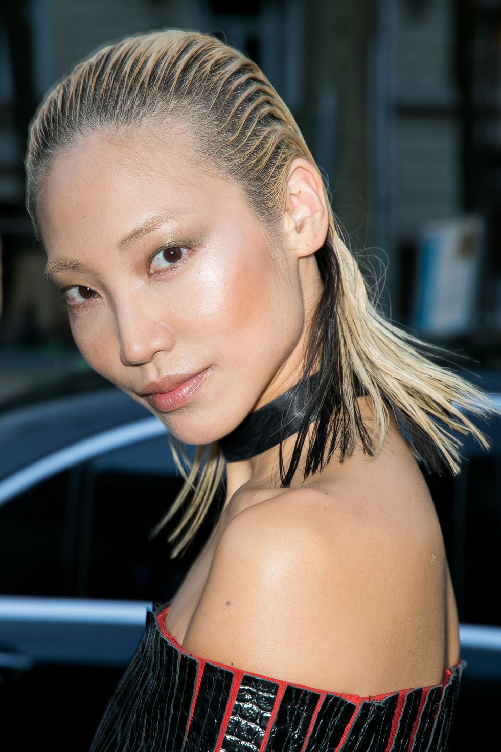 <p>Model Soo Joo Park marries two of-the-moment trends: a daring dye job and slicked back strands.</p>