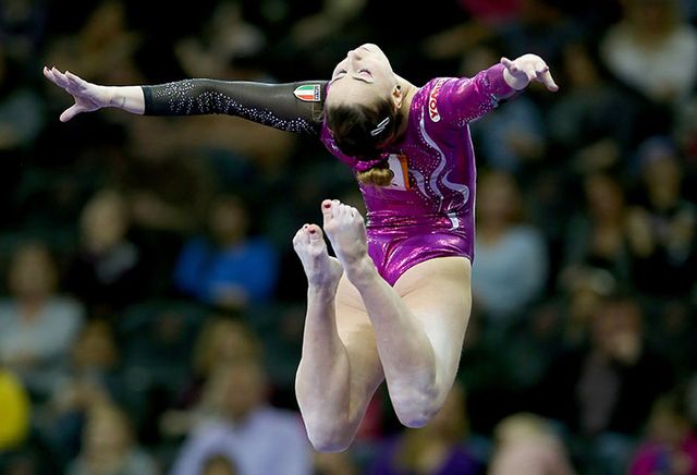 Sportswear, Human leg, Purple, Gymnastics, Acrobatics, Championship, World, Artistic gymnastics, Athlete, Leotard, 