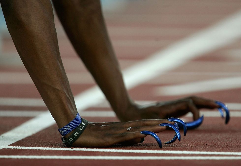 ATHENS - AUGUST 22:  Gail Devers of USA nails are seen in the beginning of the race of the women's 100 metre hurdle on August 22, 2004 during the Athens 2004 Summer Olympic Games at the Olympic Stadium in the Sports Complex in Athens, Greece.(Photo by Donald MiralleGetty Images)