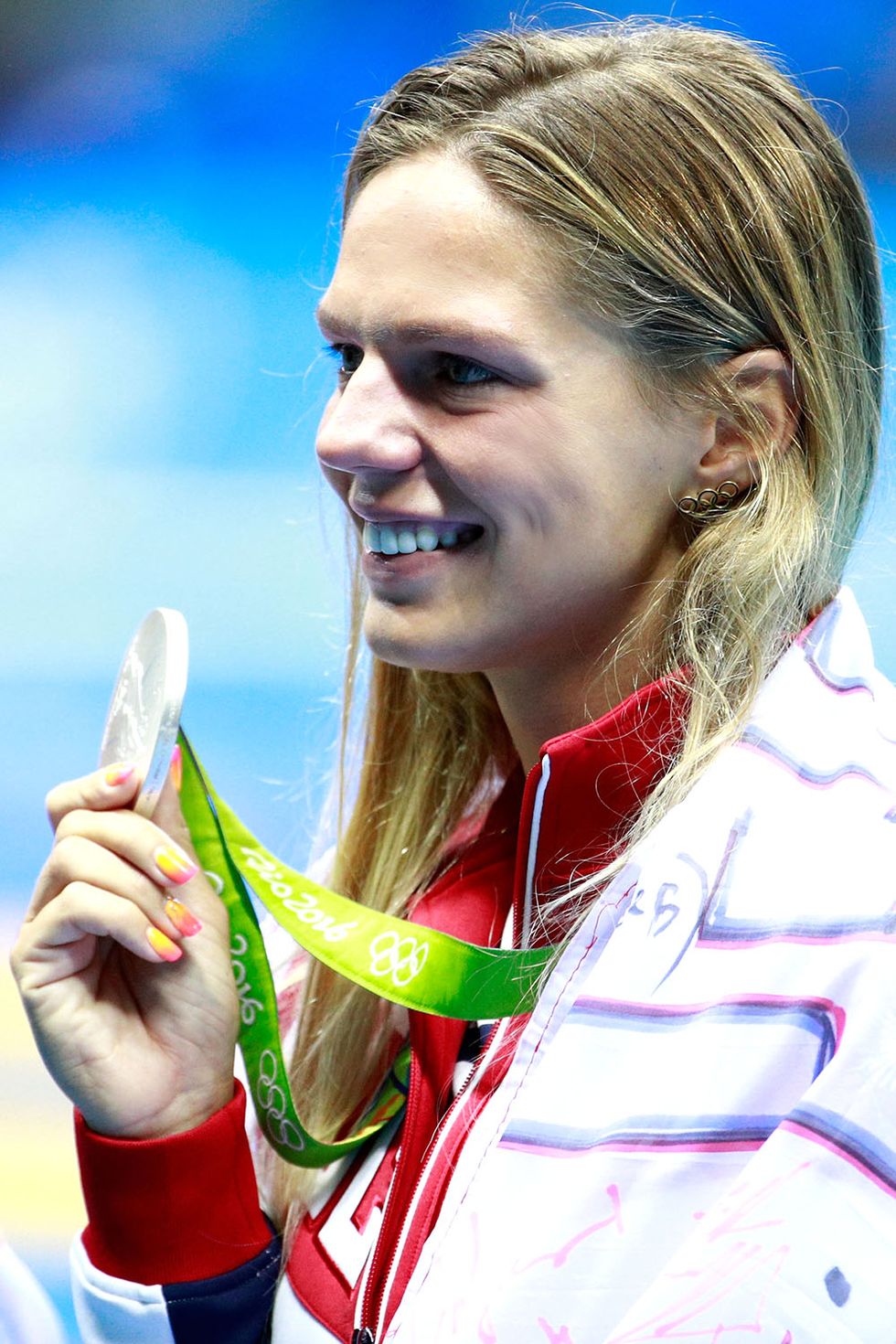 <p>The Russian swimmer and silver medalist may have gotten booed in the pool as a result of doping rumors; her ombre yellow to pink nails were still on point.</p>