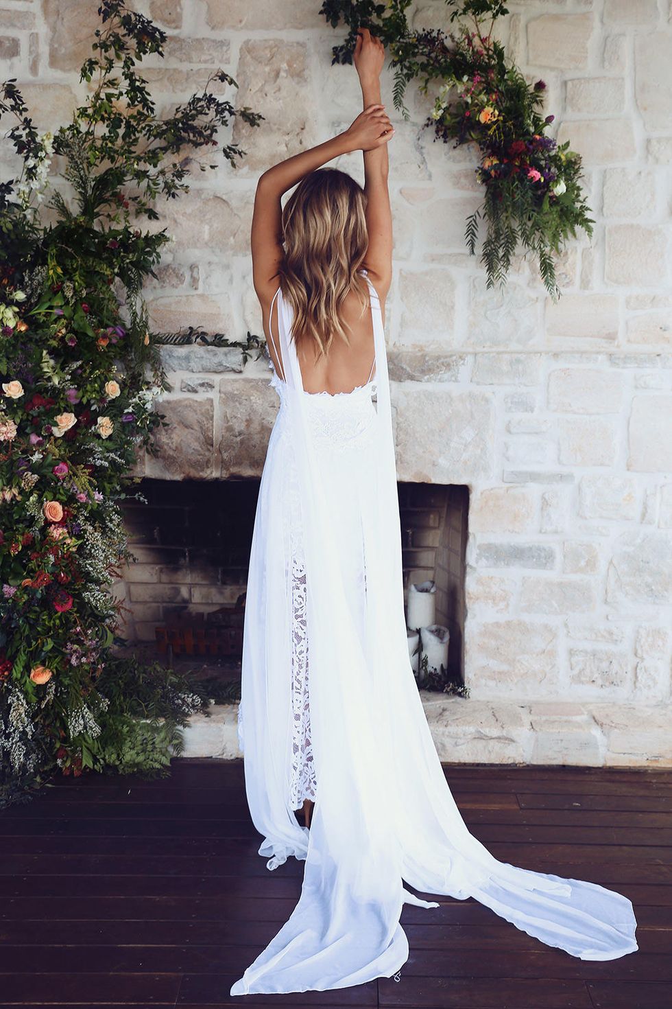Dress, Shoulder, White, Formal wear, Gown, Bridal clothing, Flooring, Petal, Waist, Wedding dress, 