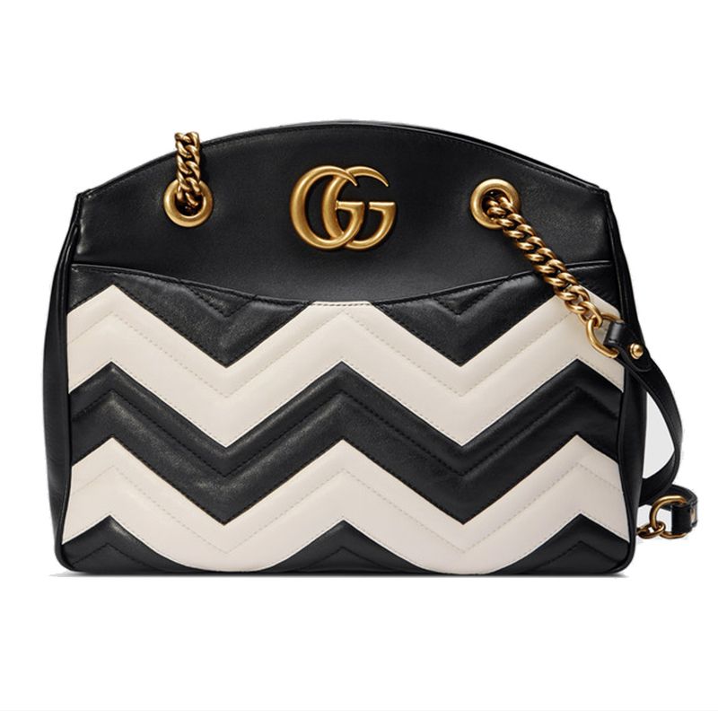 <p><em>Gucci bag, $2,390, <a href="https://www.gucci.com/us/en/pr/women/handbags/womens-shoulder-bags/gg-marmont-matelass-tote-p-443501DRWRT1089?position=32&listName=ProductGridComponent&categoryPath=Women/Handbags/Womens-Shoulder-Bags" target="_blank">gucci.com</a>.</em></p>