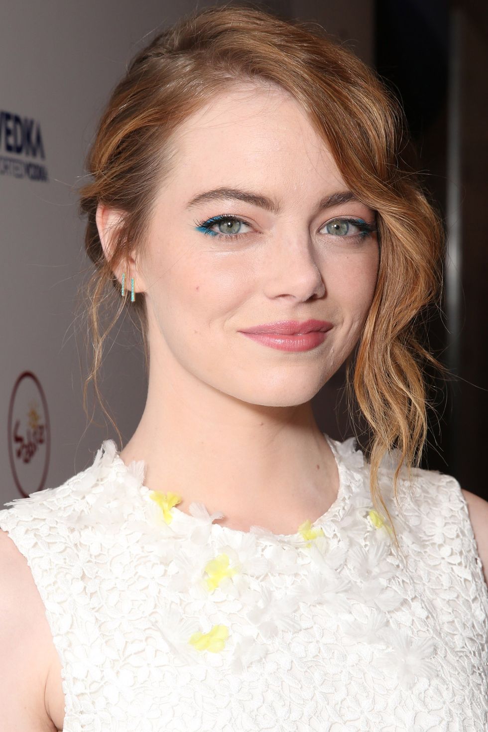 <p>Emma Stone knows the chic way to wear color:&nbsp;ombré&nbsp;strawberry blonde strands, bright blue liner, and touches of yellow on top.<span class="redactor-invisible-space"></span></p>