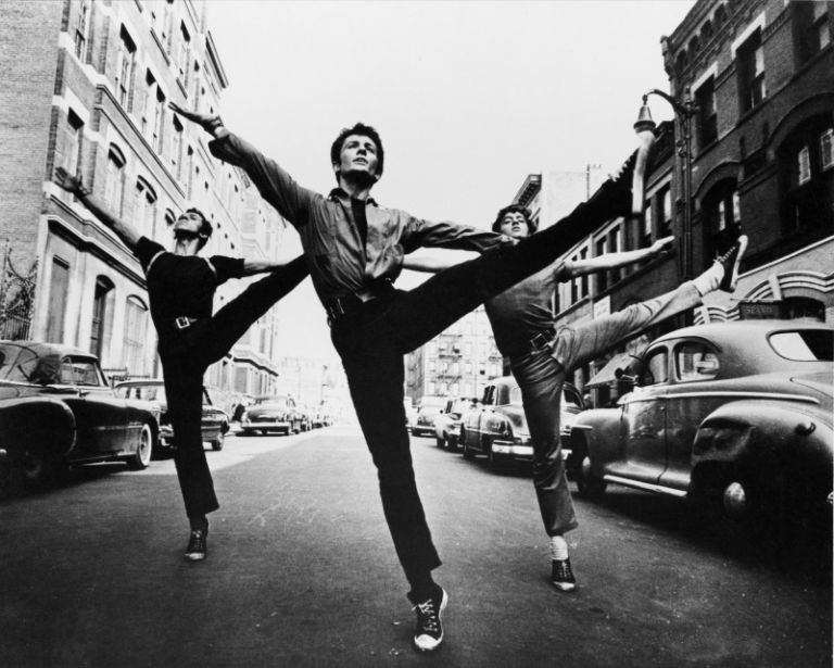 George Chakiris (centre), US actor, dancing in the street in a publicity image issued for the film, 'West Side Story', USA, 1961. The musical, directed by Jerome Robbins (1918-1998) and Robert Wise (1914-2005), starred Chakiris as 'Bernardo Nunez'. (Photo by Silver Screen Collection/Getty Images)