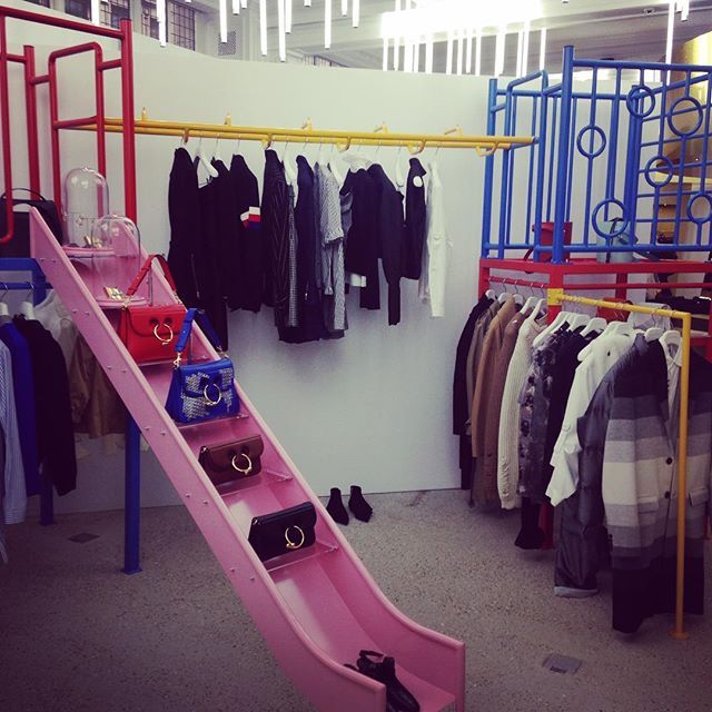 Playground slide, Clothes hanger, Chute, Human settlement, Outlet store, Boutique, Collection, Outdoor play equipment, Retail, 