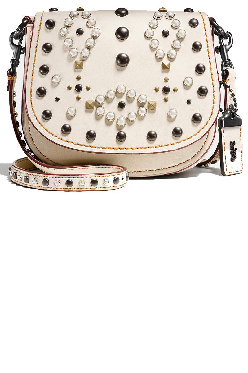 <p><strong data-redactor-tag="strong" data-verified="redactor">Coach</strong> bag, $450, <a href="http://www.coach.com/coach-designer-crossbody-western-rivets-saddle-bag-17-in-glovetanned-leather/56564.html?search=true&amp;dwvar_color=BPCHK" target="_blank">coach.com</a>.</p>