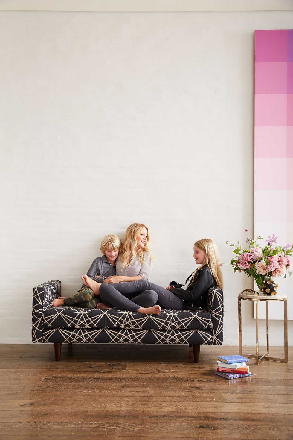 <p>"I love setting up a place at home–a moment where we can&nbsp;hang out. Sometimes my kids favor this settee over the big sofa.&nbsp;I think it's&nbsp;so we can snuggle,&nbsp;but it's also the reading nook. Everyone needs a nook."</p><p><span class="redactor-invisible-space" data-verified="redactor" data-redactor-tag="span" data-redactor-class="redactor-invisible-space"></span></p>