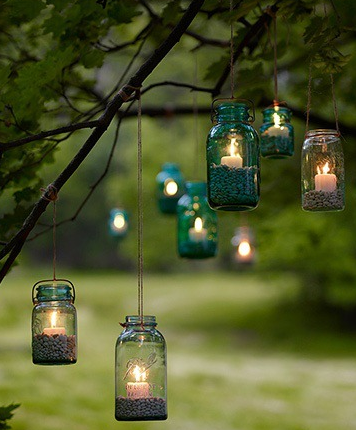 lanterne portacandele con vasetti di marmellata