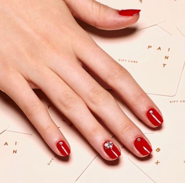 <p>Tiny crystals instantly add a holiday spin to a signature red manicure.</p><p><a href="https://www.instagram.com/julieknailsnyc/?hl=en" target="_blank" data-tracking-id="recirc-text-link"><em data-redactor-tag="em" data-verified="redactor">@julieknailsnyc</em></a></p>