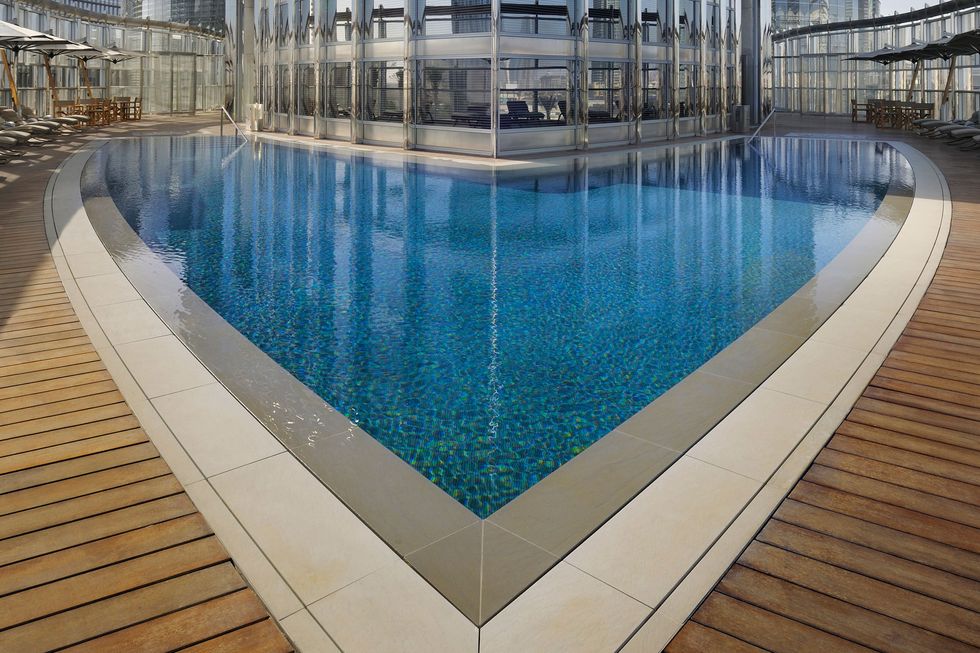 Swimming pool, Blue, Flooring, Floor, Reflection, Aqua, Hardwood, Azure, Composite material, Tile, 