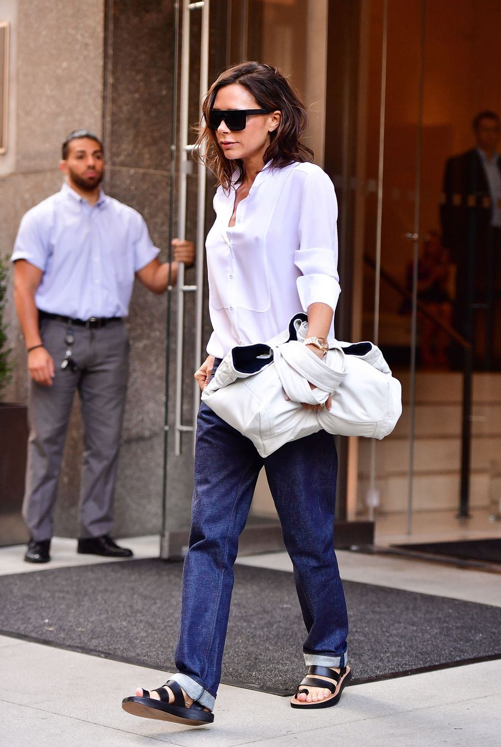 <p>Once upon a time, Beckham was only ever pictured in towering heels. Now, the landscape has changed and she's big on leather sandals and box-fresh trainers. Expect to see a pair of chic flats in her Target range. </p>