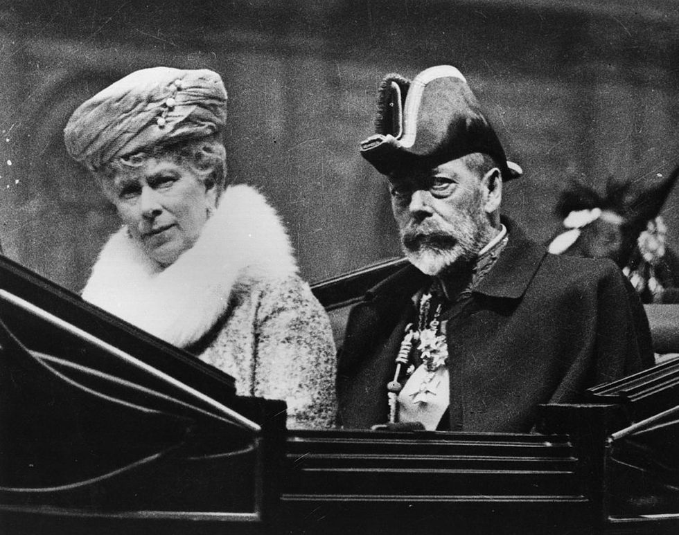 <p>King George V and Queen Mary in a carriage on their way to the Knights of St John Ceremony at Westminster Abbey.</p>