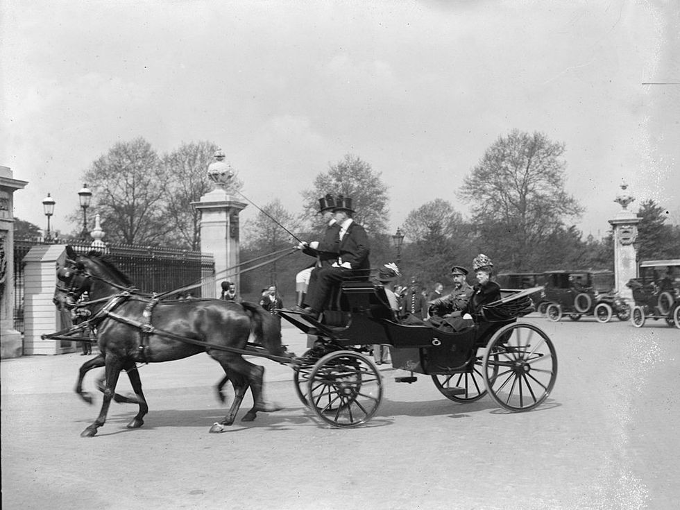 <p>Queen Mary and King George V leaves <a href="http://www.townandcountrymag.com/society/tradition/news/a7820/tour-buckingham-palace/" target="_blank" data-tracking-id="recirc-text-link">Buckingham Palace</a>.&nbsp;<span class="redactor-invisible-space" data-verified="redactor" data-redactor-tag="span" data-redactor-class="redactor-invisible-space"></span></p>