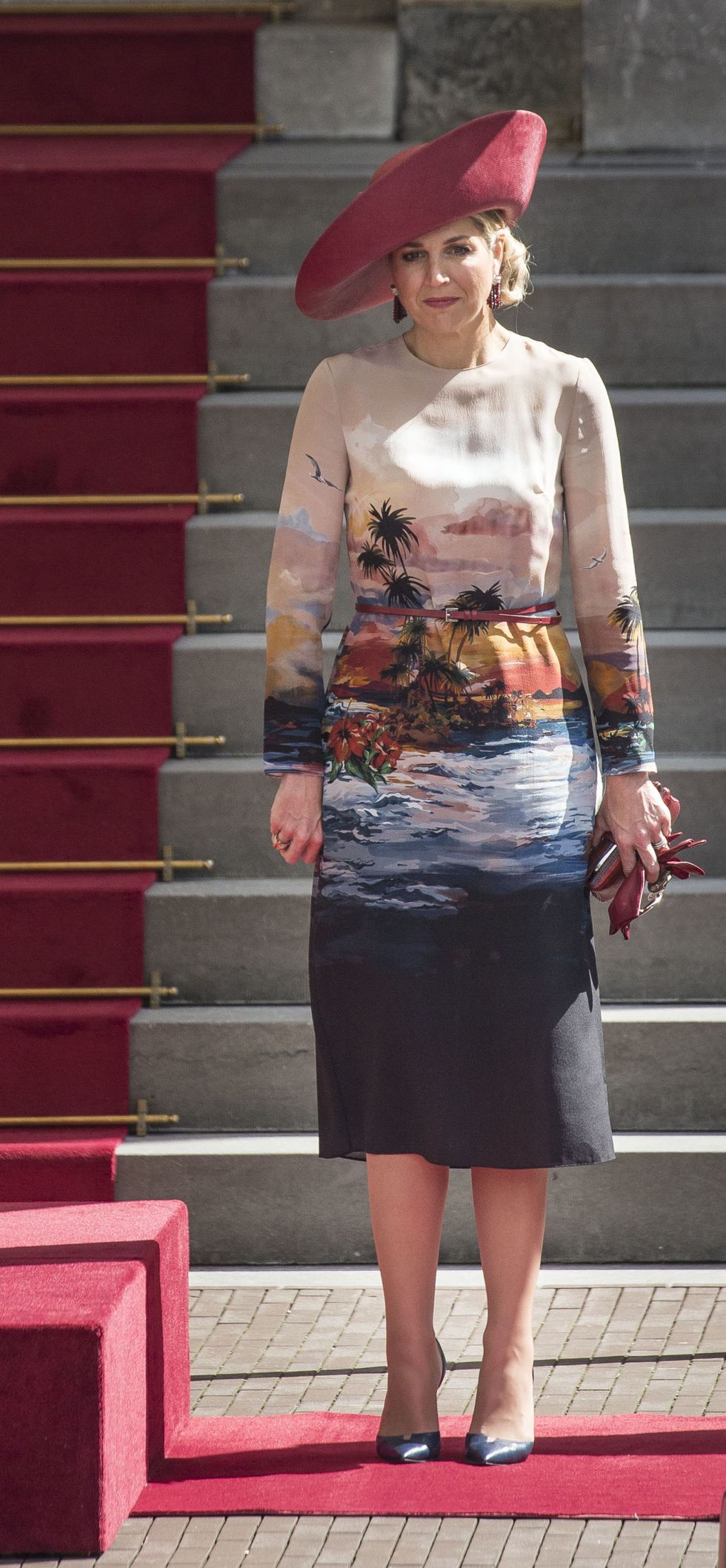<p>She's unafraid to take risks, such as this tropical-print shift dress.<span class="redactor-invisible-space" data-verified="redactor" data-redactor-tag="span" data-redactor-class="redactor-invisible-space"></span></p>