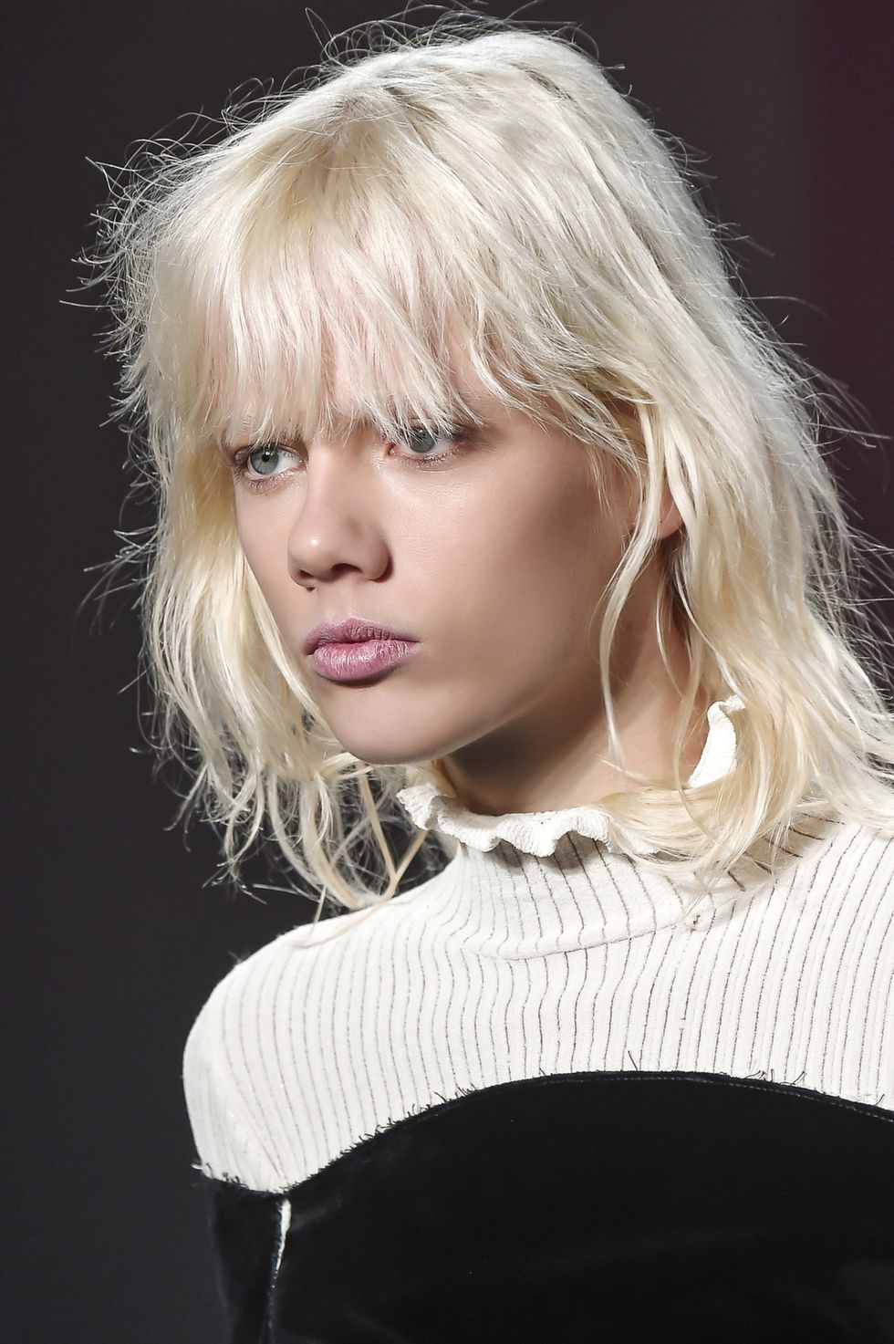 Mouth, Lip, Hairstyle, Chin, Style, Bangs, Step cutting, Blond, Sweater, Fashion model, 
