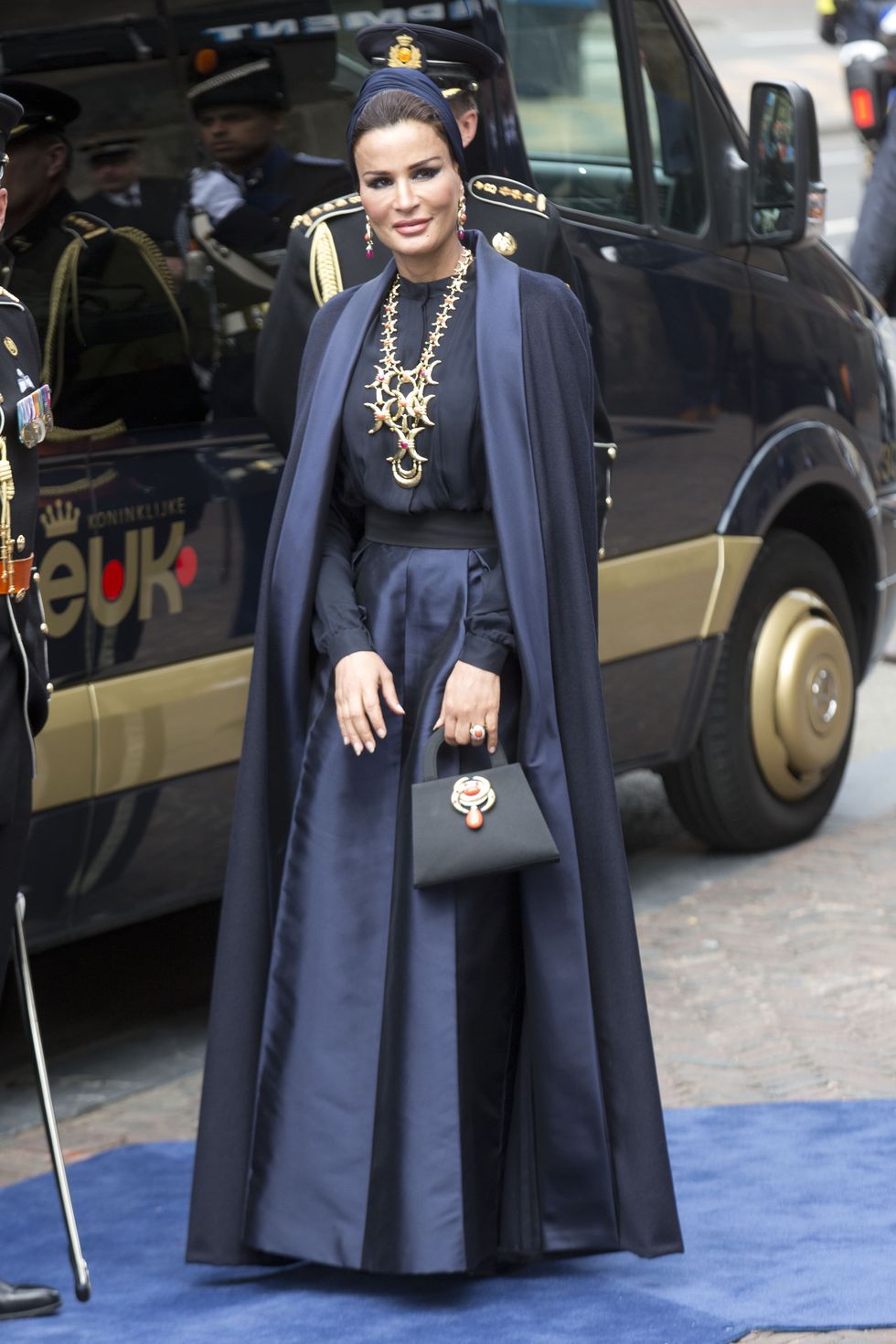 <p>Here, she's had a Valentino couture cape and dress customized, which she then&nbsp;accented with oversized David Webb jewelry. <span class="redactor-invisible-space" data-verified="redactor" data-redactor-tag="span" data-redactor-class="redactor-invisible-space"></span></p>
