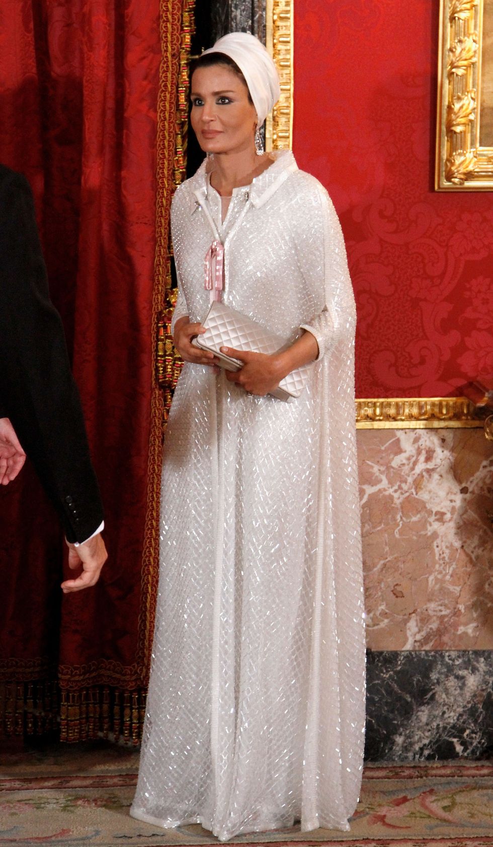 <p>She's often cited as one of the most elegant women the world. For an official engagement in Spain (<em data-redactor-tag="em" data-verified="redactor">pictured here</em>), she wore custom Chanel couture. <span class="redactor-invisible-space" data-verified="redactor" data-redactor-tag="span" data-redactor-class="redactor-invisible-space"></span></p>