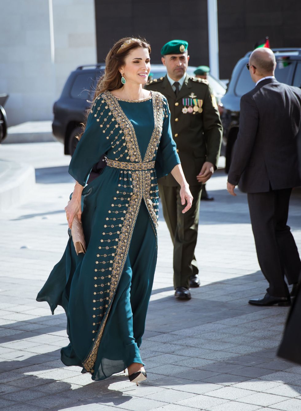<p>A deep teal chiffon gown and ornamental gold headband helped her ring in the celebration of the centennial of the great Arab revolt earlier this year. <span class="redactor-invisible-space" data-verified="redactor" data-redactor-tag="span" data-redactor-class="redactor-invisible-space"></span></p>