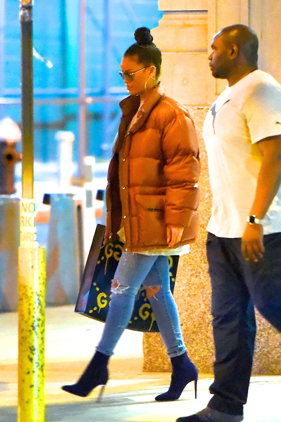 <p>Start off with the classic pairing: puffer jacket, jeans and ankle boots. Top it off with a statement bag like the GucciGhost tote.&nbsp;(Mind you, Rihanna wore this in August.)&nbsp;</p>
