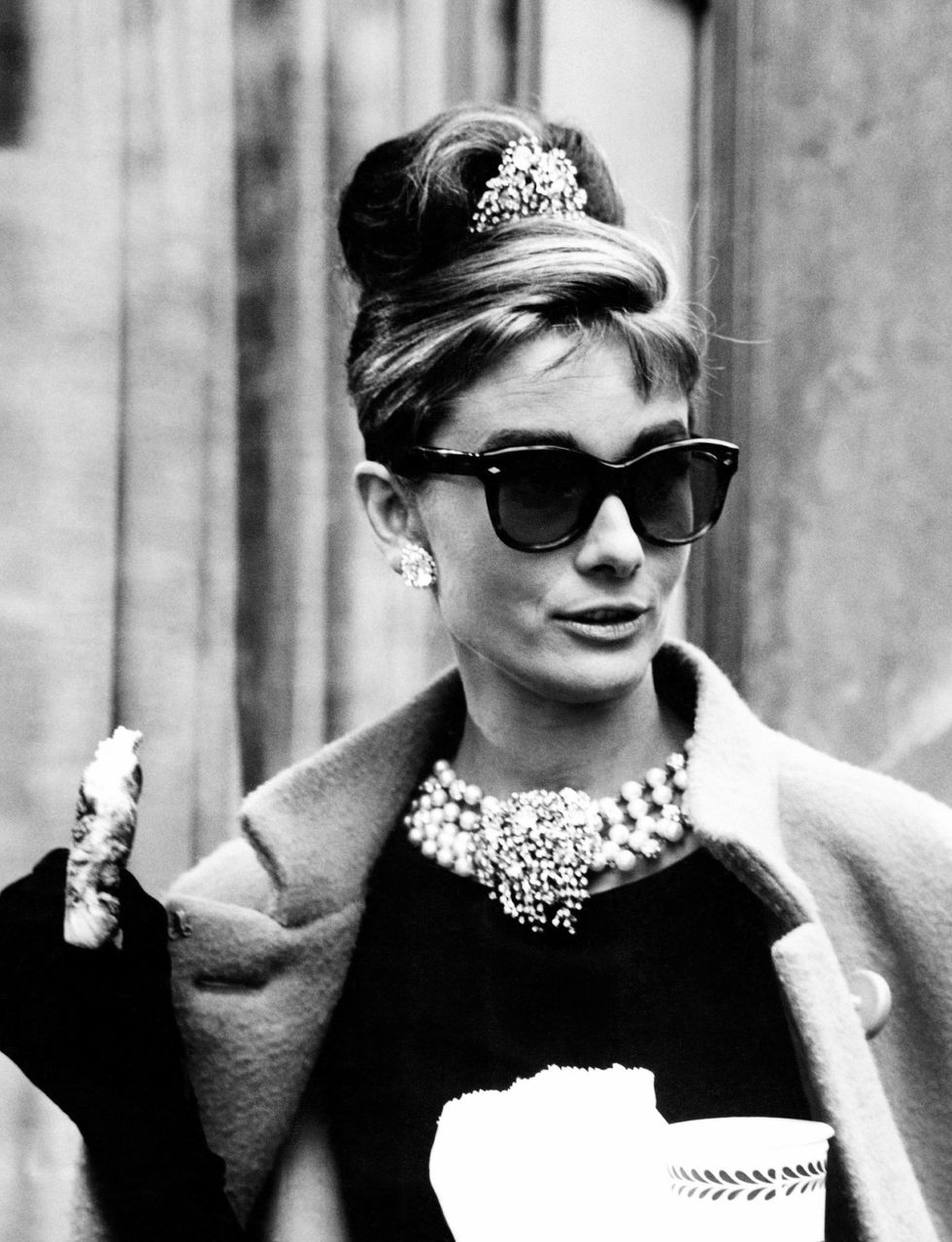 <p>The baby bags, chunky blonde highlights, and twisted updo that Holly Golightly wears in <em data-redactor-tag="em" data-verified="redactor">Breakfast at Tiffany's</em> is often imitated, never duplicated.&nbsp;</p>