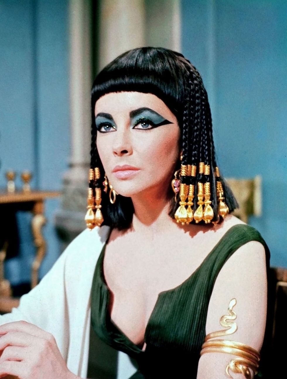 <p>The hair might be second fiddle to the makeup in <em data-redactor-tag="em" data-verified="redactor">Cleopatra</em>, but it's truly just as incredible. Gilded with beads or covered in elaborate headpieces, Elizabeth Taylor wore the dramatic styles with regal ease.</p>