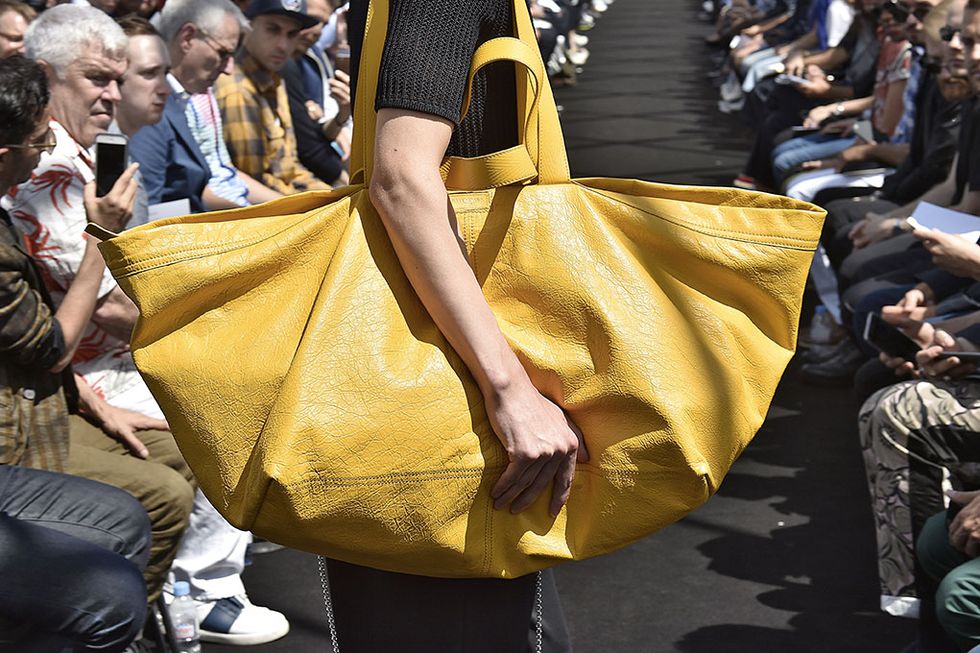 Yellow, Crowd, Bag, Luggage and bags, Street fashion, Audience, Shopping, Handbag, Shoulder bag, 