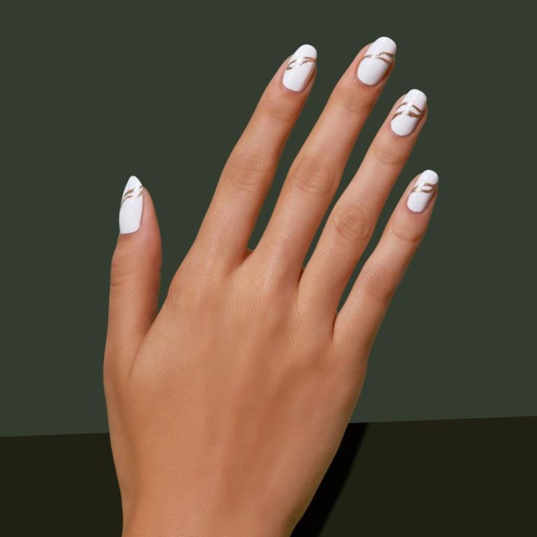 <p>When an all-white manicure feels too stark, warm it up with a hint of gold.</p><p><a href="https://www.instagram.com/p/BLr0Nc0g9SP/?hl=en"></a><a href="https://www.instagram.com/p/BLr0Nc0g9SP/?hl=en" target="_blank" data-tracking-id="recirc-text-link">@paintboxnails</a></p>