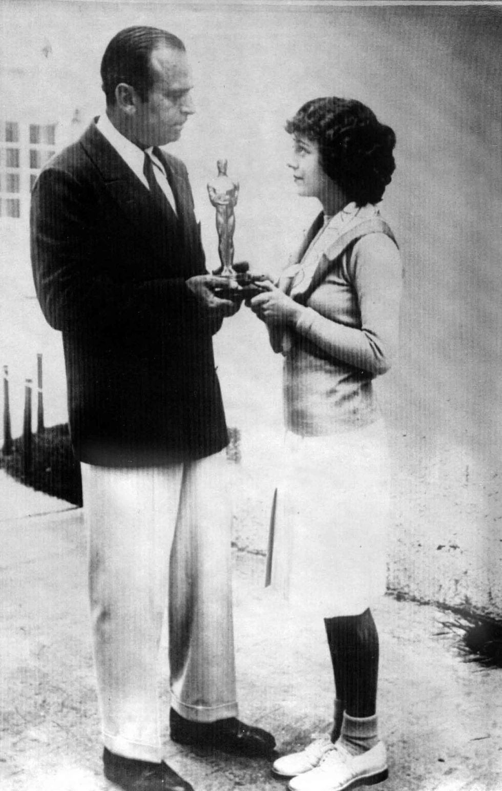 <p>At the first Academy Awards, winners were announced three months in advance and were chosen on the basis of all their film work during the calendar year. The girlish Janet Gaynor won the first Best Actress award, here accepting the statue, pre-ceremony, from Academy president Douglas Fairbanks.<span class="redactor-invisible-space" data-verified="redactor" data-redactor-tag="span" data-redactor-class="redactor-invisible-space"></span></p>