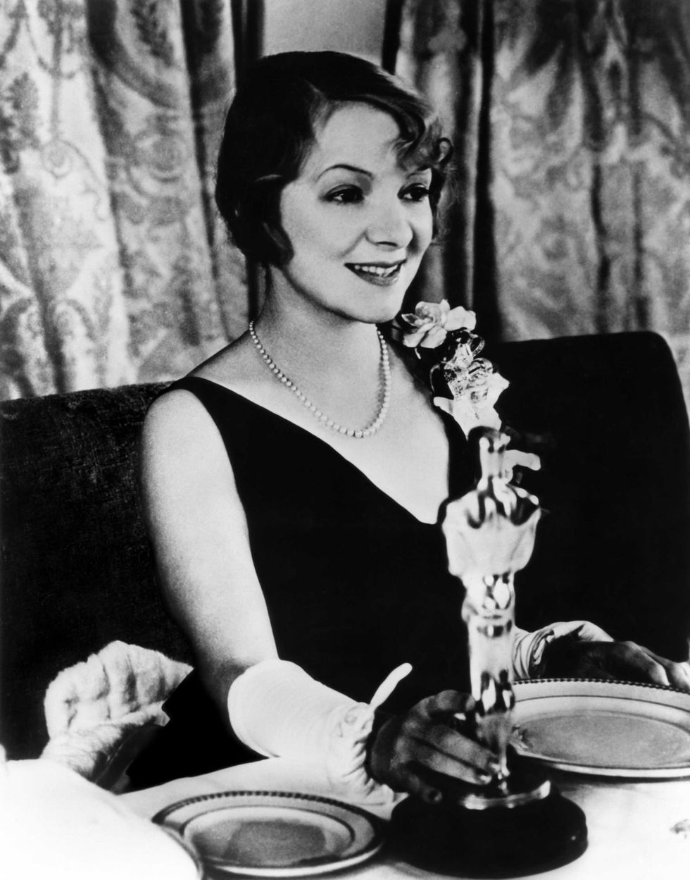 <p>Helen Hayes displays her Best Actress award, earned for <i data-redactor-tag="i">The Sin of Madelon Claudet</i><i data-redactor-tag="i">.</i> In the course of her long career,<i data-redactor-tag="i"> </i>Hayes won an Emmy, a Grammy, an Oscar, and a Tony, an achievement only 12 people to date can claim.<span class="redactor-invisible-space" data-verified="redactor" data-redactor-tag="span" data-redactor-class="redactor-invisible-space"></span><span class="redactor-invisible-space" data-verified="redactor" data-redactor-tag="span" data-redactor-class="redactor-invisible-space"></span></p>